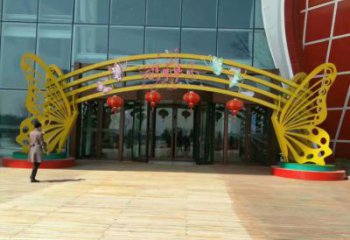 怒江蝴蝶拱門雕塑,鏤空烤漆效果,不銹鋼小區標識雕塑